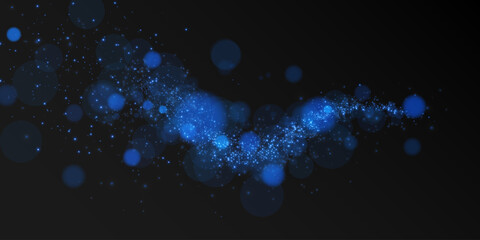 A glowing blue bokeh effect on a dark background, creating a futuristic, magical, and dreamy atmosphere. The sparkling light particles resemble a cosmic or fantasy-like energy flow. © andreu1990