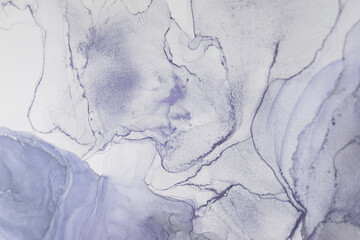 Abstract alcohol ink artwork in soft purple and gray tones highlighting fluid patterns