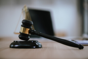 Lawyer's Hammer, Law Hammer, a symbol of justice and power. Legal documents, contracts and books...