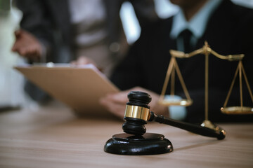Lawyer's Hammer, Law Hammer, a symbol of justice and power. Legal documents, contracts and books...