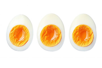 Sliced hard-boiled eggs arranged on a transparent background, showcasing vibrant yolks and smooth white surfaces for culinary presentations or nutrition concepts