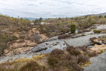 Skrelifallan Waterfall surroundings, Skrelia, Lyngdal, Norway..