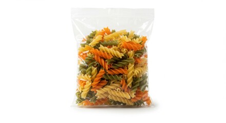 Colorful Rotini Pasta in Clear Plastic Bag Isolated on White