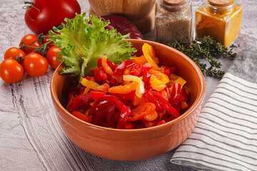 Diced raw bell red and yellow pepper