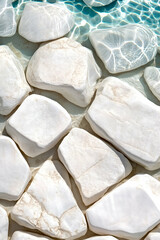 A close-up of smooth, white stones submerged in clear water, creating a serene and tranquil aquatic scene.