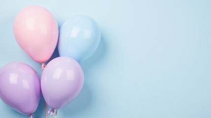 Pastel Balloons Floating on a Light Blue Background, a Delightful Image Perfect for Celebration Invitations or Festive Designs