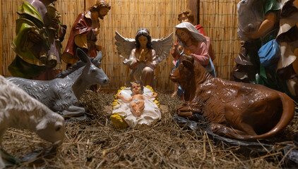 Nativity scene figures placed in church