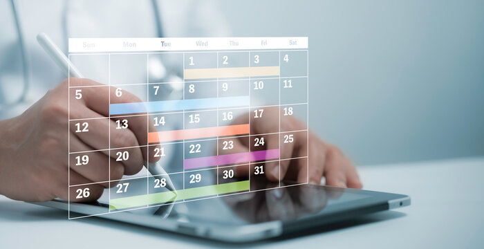 Doctor managing a digital calendar on a tablet, illustrating AI-driven medical scheduling and healthcare organization - Powered by Adobe