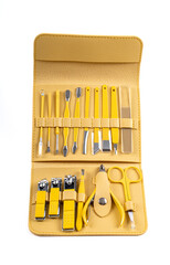 Manicure set kit in case, Manicure kit with stainless steel manicure and pedicure tools neatly organized in a yellow leather case. The kit includes essential grooming tools for nail care