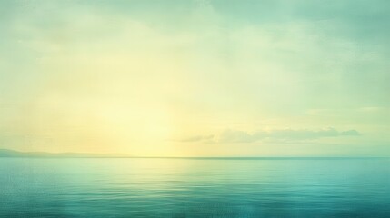 Obraz premium Serene seascape at sunset, featuring a tranquil ocean under a soft, pastel sky. The image has a vintage, slightly textured filter applied, creating a