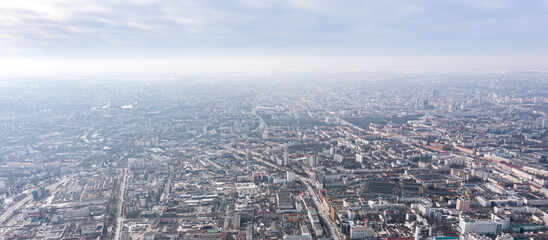 city panorama from the height of the drone flight. residential area in the winter. aerial overhead view.