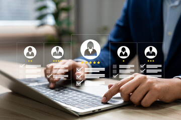 Human resource technology, HR recruitment and team management, Human resource manager reviewing online CVs to select perfect candidate for employment using digital technology and networking tools