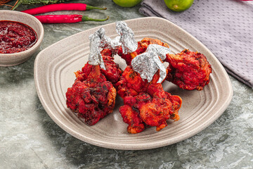 Indian cuisine - Red Chicken lolypops