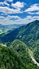 View of the mountains and the Dunajec River from above in Pieniny National Park, Poland. Seen from the trail between Mount Sokolica and Mount Trzy Korony. Perfect for travel, hiking and outdoor themes © Krystsina_Semianiuk