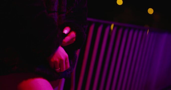 Woman Standing Under Neon Lights, slow motion