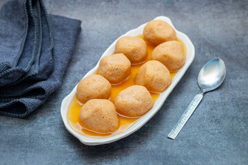 Nolen Gurer Rosogolla, A Sweet Bengali Delicacy Made with Date Palm Jaggery, Perfect for Festivities and Traditional Occasions