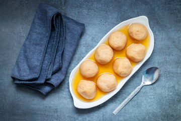 Nolen Gurer Rosogolla, A Sweet Bengali Delicacy Made with Date Palm Jaggery, Perfect for Festivities and Traditional Occasions