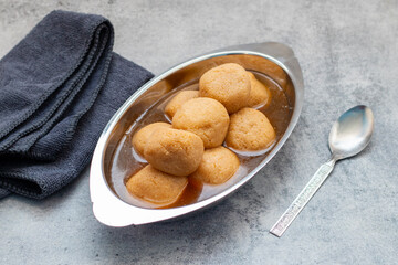Nolen Gurer Rosogolla, A Sweet Bengali Delicacy Made with Date Palm Jaggery, Perfect for Festivities and Traditional Occasions