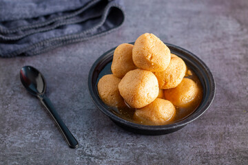 Delightful Nolen Gurer Rosogolla, A Sweet Bengali Tradition with Rich Flavors and Unique Date Palm Jaggery Essence