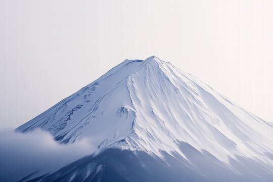 Mount Fuji covered in snow with clear skies, showcasing natural beauty and tranquility. Ideal for travel promotion, hiking adventures, or landscape photography.