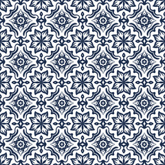 Fototapeta premium Elegant Blue and White Ornamental Tile Pattern with Soft Floral Accents