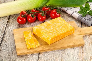 Marble yellow cheese with slices