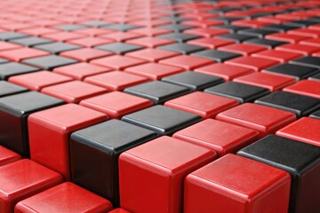 Fototapeta premium Close-up view of red and black cubes in a repeating pattern, art, cube, abstract, texture