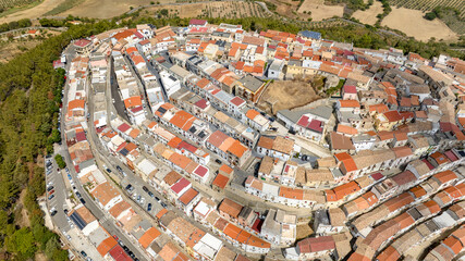 Fototapeta premium Aerial view of the town of Rotondella located on a hill in Basilicata, Italy. 