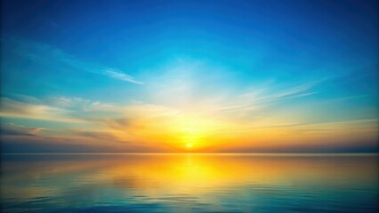 Naklejka premium Soft yellow sunset with gradient background fading into blue hues of dusk, dusk, evening atmosphere
