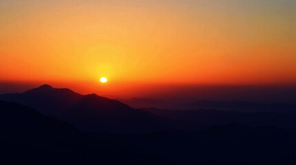 Fototapeta premium Tropical beach at sunset with sparkling ocean, light sand, and a blurred horizon.
