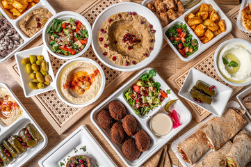 Composition from above with typical Lebanese and Middle Eastern dishes, with falafel, hummus ,...
