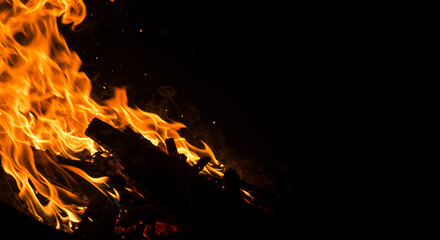 Fiery Bonfire Burning Bright at Night, Close-Up View