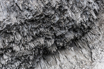 Volcanic rock formations revealing complex geology in Iceland's rugged terrain