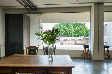 Wooden chair and table in Korean restaurant or minimal cafe style with view of city in seoul korea,cafe japan or korea concept..