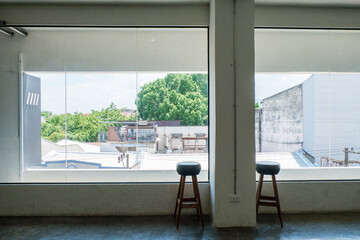 Fototapeta premium Empty chair in Korean restaurant or minimal cafe style with a wonderful view of city in seoul korea.