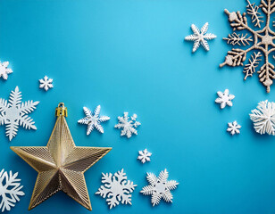 Corner border of blue Christmas stars and snowflakes on a background of weathered rustic old wooden planks with copy space for your seasonal greeting