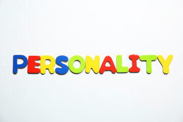 Word Personality made of colorful letters on white background, top view