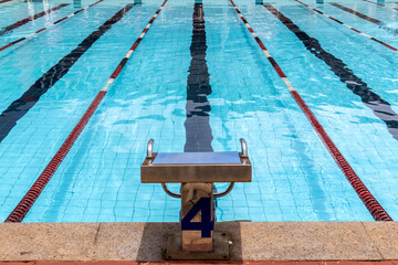 Starting platforms with number 4 for swimming races and competitions in Brazil. Swimming pool...