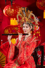 Obraz premium Young asian woman with chinese new year