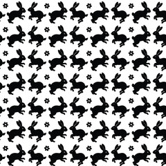 Seamless pattern of cute bunnies. Cute spring Easter rabbit with black and white flower petals. Background texture for Easter and Baby greetings.
