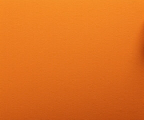 Fototapeta premium Minimalist Textures of Paper Concept, Bright orange textured background with subtle variations in tone