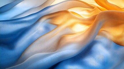 Obraz premium Flowing Fabric in Soft Blue and Golden Tones under Natural Light