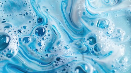 Blue serum with textured bubbles close-up in skincare product.