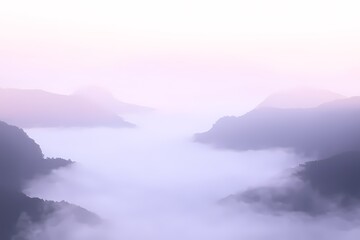 Obraz premium Ethereal Misty Mountains. A mystical, ethereal landscape featuring soft, mist-covered mountains fading into a dreamy pastel sky. The scene is bathed in gentle light, with subtle hues of lavender