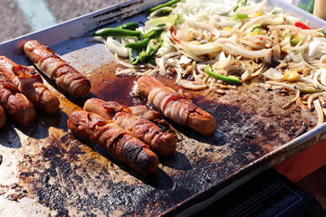 hotdogs on grill