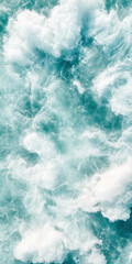 Obraz premium Turbulent ocean waves crashing creating white sea foam with dynamic aerial perspective of natural aquatic motion
