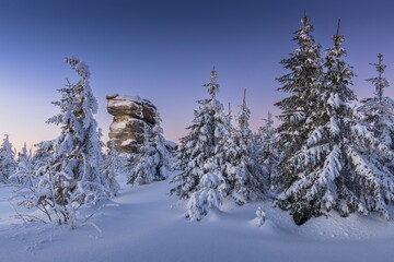 Winter landscape of Šumava. Beautiful landscape picture. Nature of Šumava. Czech Republic. Winter motif. Snowy region. Sunrise over the mountains. 
