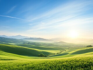 A breathtaking view of rolling green hills under a bright blue sky, with the sun rising on the horizon, capturing the beauty of nature and serene landscapes.