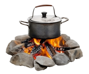 Black pot over a campfire with burning logs, isolated on transparent cutout background