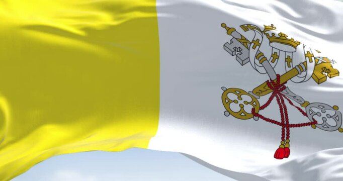 Close-up of Vatican City flag waving in the wind